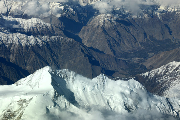 The summit of Rakaposhi with the Hunza Valley and Aliabad, Pakistan