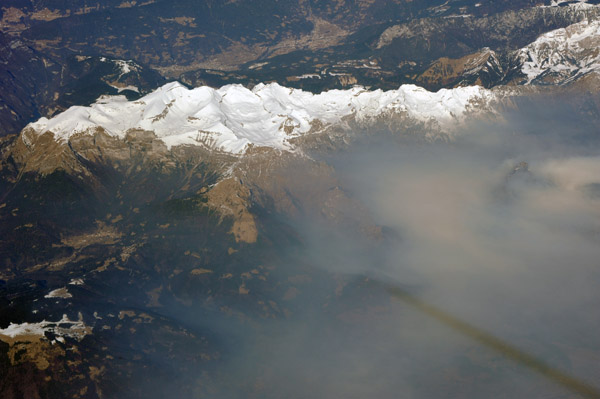 Monte Pavione with pollution from Feltre, Italy
