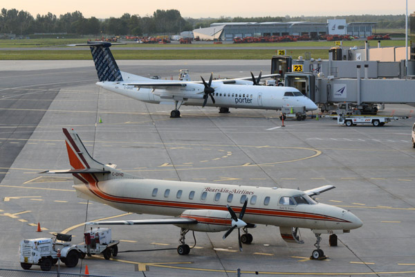 Bearskin Airlines Metroliner (C-GYHD) and Porter Dash-8 (C-GKQD) at YOW