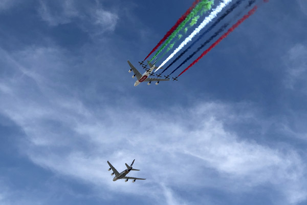 Emirates A380 following an Etihad A380 with Al Fursan, the UAE Air Force aerobatic team