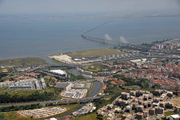 Tranco River joins the Tagus near the Vasco da Gama Bridge, Lisbon