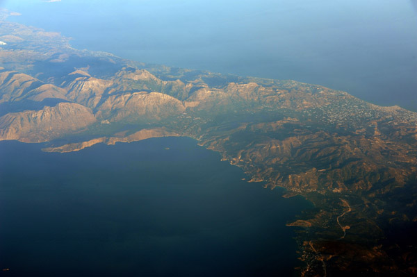 Mirabello Bay on the north side and Ierapetra on the south shore of Crete