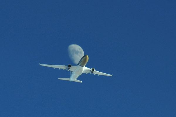 Gulf Air A330 captured in flight with the 3/4 moon