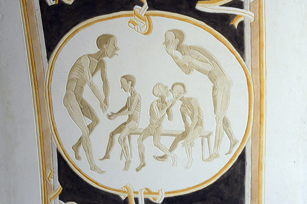 Two men and 3 children on a bench in a round frame