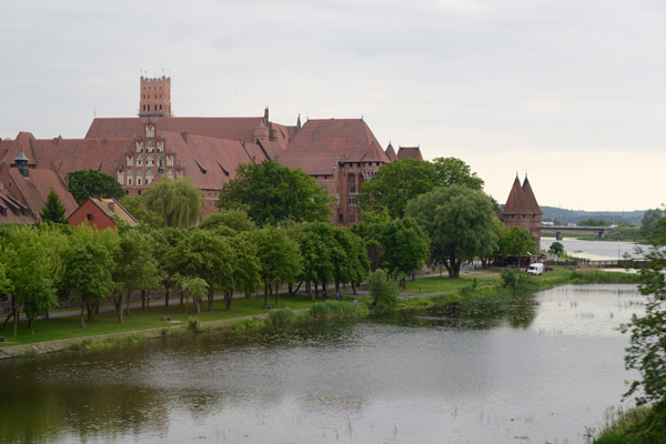 Malbork Castle from the train crossing the Nogat River