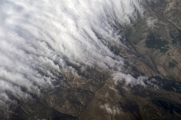 Clouds pouring over the mountain ridge at Kılıkaya near Bayburt, Turkey