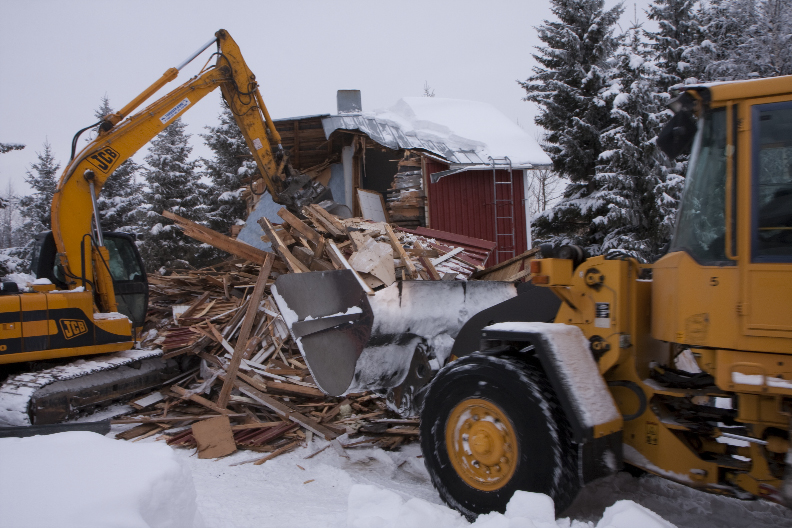 A front loader removes all wood II
