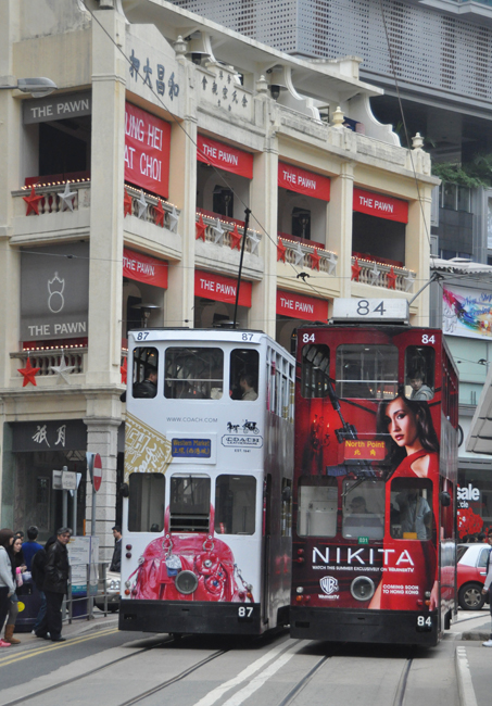 Trams passing in Wanchai  H.Kong