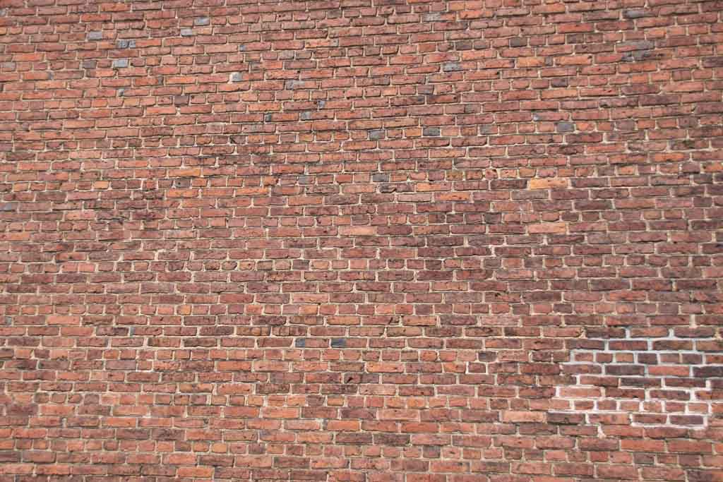 THE BRICK WALL