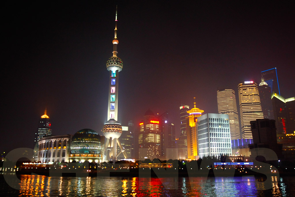 Shanghai skyscrappers and the Oriental Pearl Tower on the Huangpu River