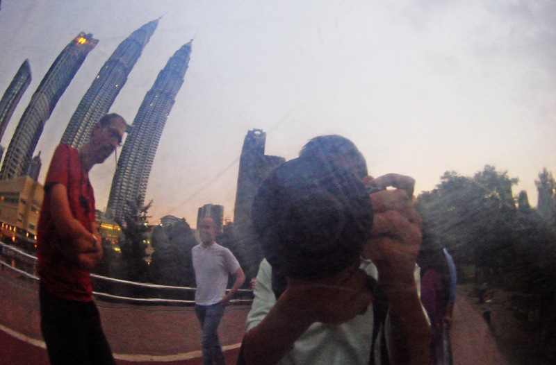 A couple of tourist, me & the twin tower by Tabrizi