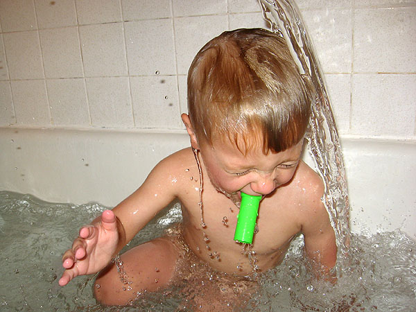 Simon uses a snorkel to survive his bathtime rinse