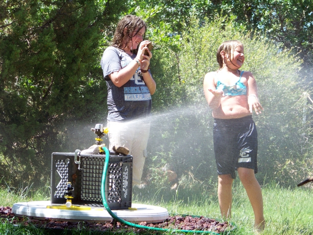 A warm afternoon<BR> under the sprinklers