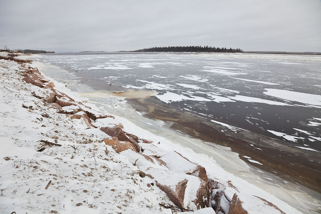 View along the shoreline of the Moose River at Moosonee 2009 December 6th looking down river. Butler Island in distance.