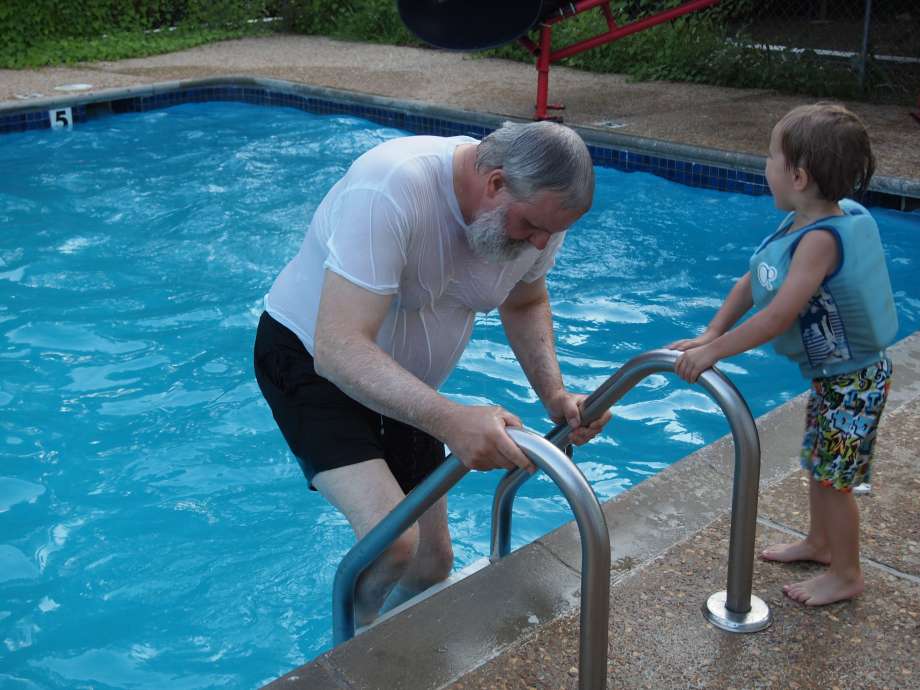 Mr Greg Conley in Dogwood Springs Cabin Pool--Adrian at Ladder
