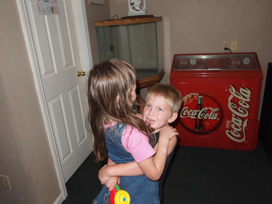 Helen Hugging One of Owners Kids As We Leave