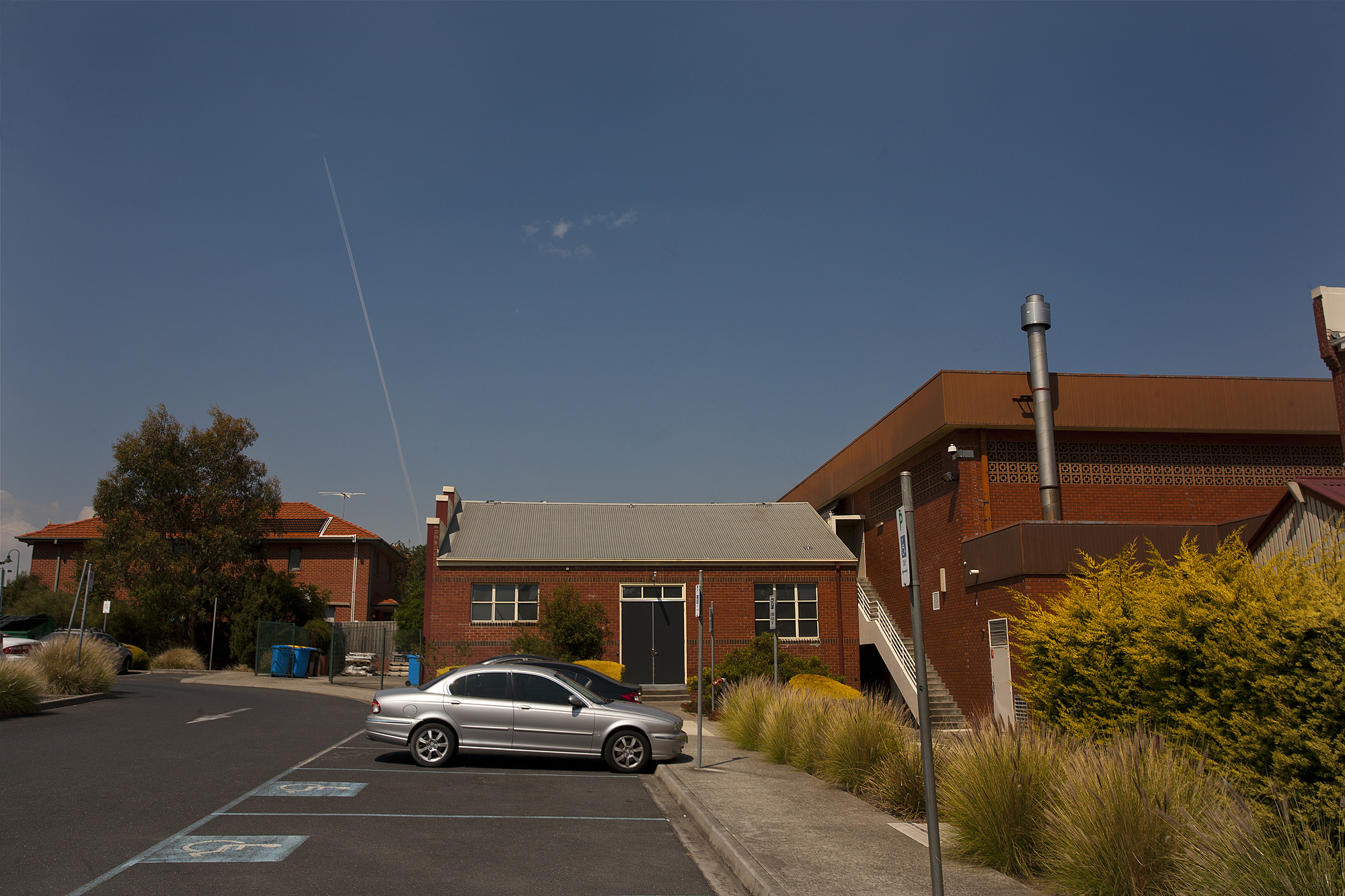 FM makes way for 3 rubbish bins and a few cars.jpg