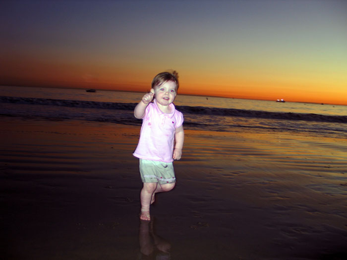 ellie_running_beach_sm.jpg