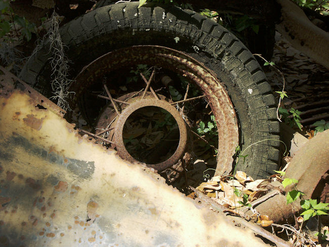 Scrapped cars near Carriage House and Stables at Dungess