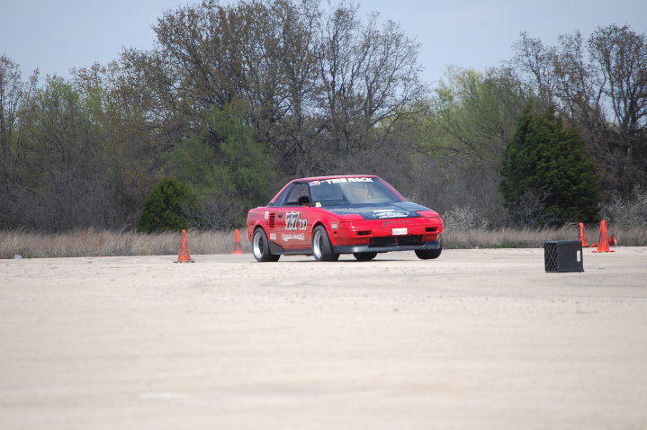 First picture of the car lifting a wheel