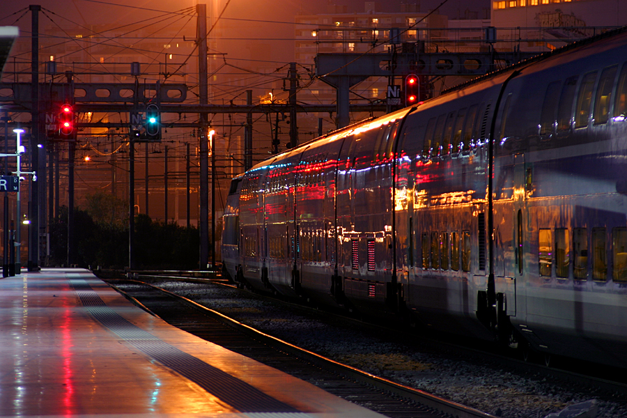 At night, a TGV Duplex at Marseille Saint-Charles.