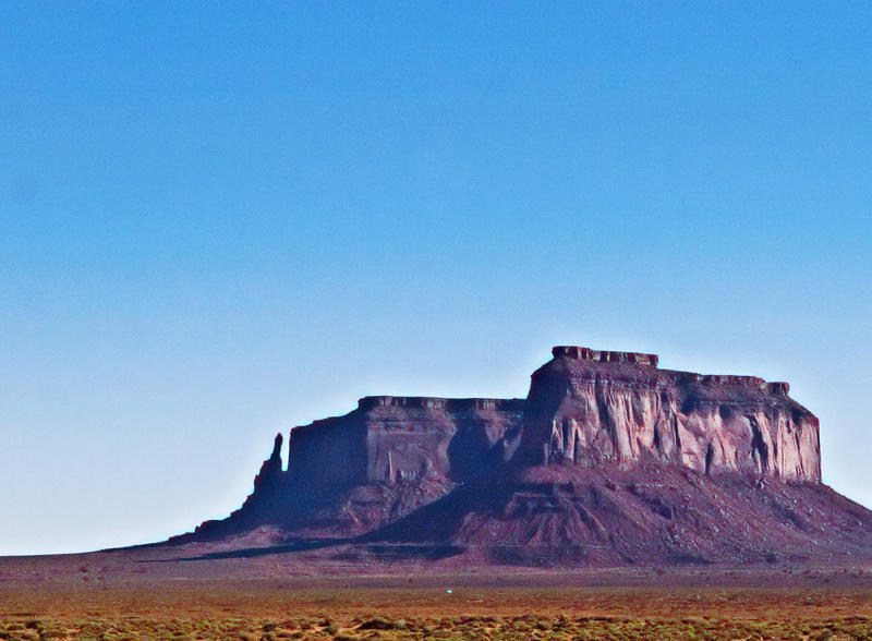 This large Mesa is called Sentinel Mesa and the small rock to the left is called Big Indian