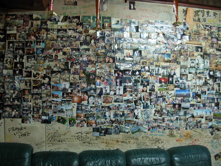 The interior walls are lined with PICs of past overnighters.