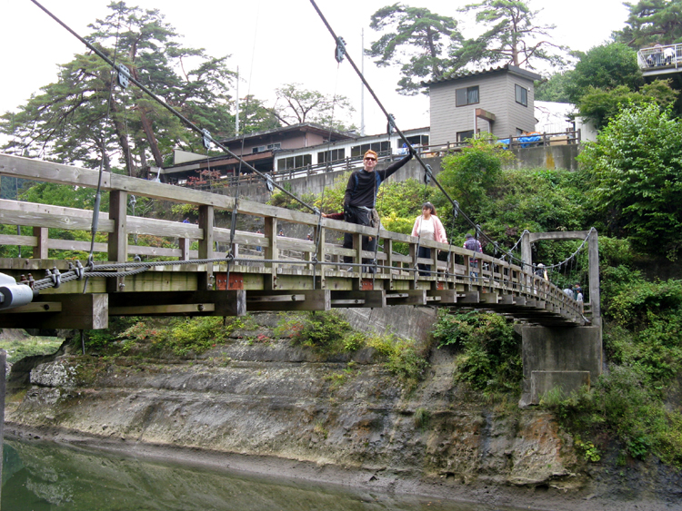 Theres a Buddhist shrine along the river bank.