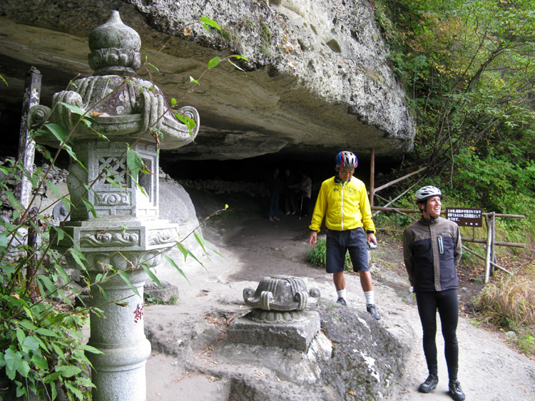 Visiting the shrine built  within the limestone.