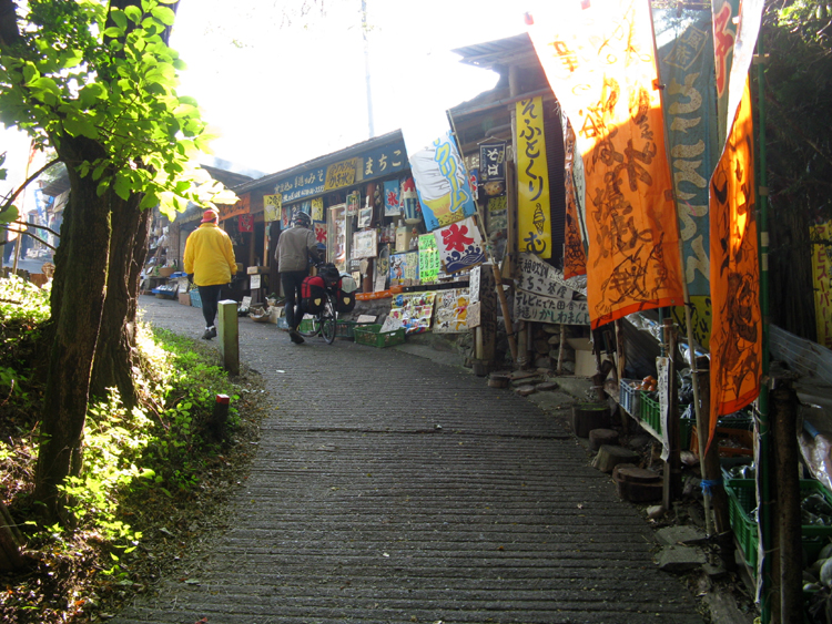 Businesses line the path to the waterfalls.