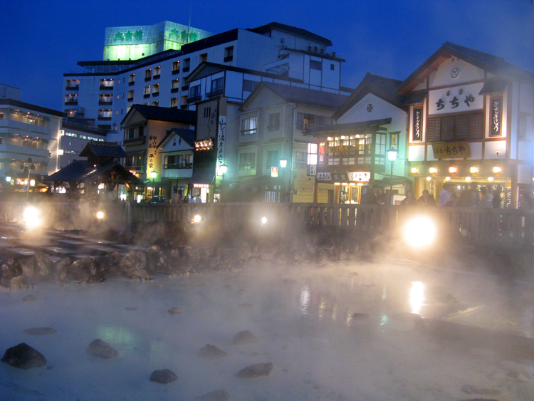Businesses are clustered around the yubatake along with a steady stream of visitors.