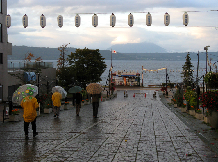 The threat of rain persisted through the evening.