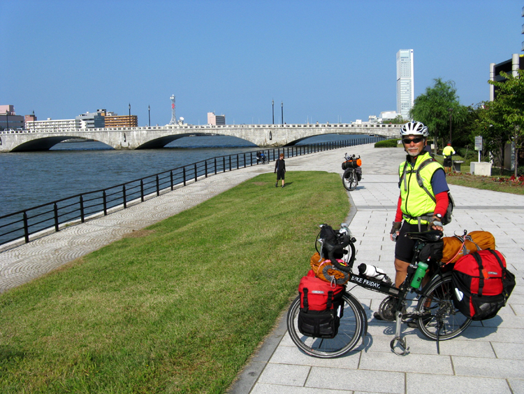 Riding the river walk in Niigata.