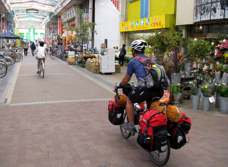 Geno riding through the marketplace.