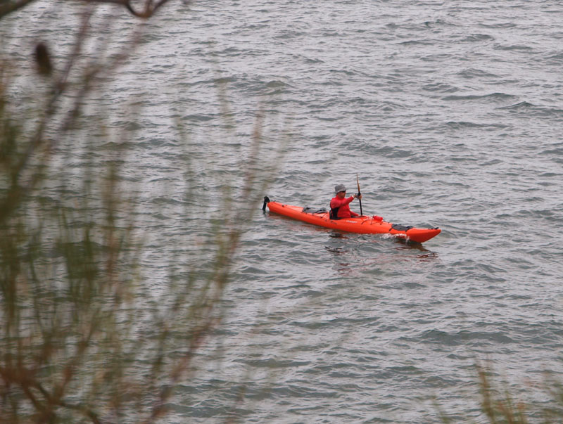 Hatted kayaker