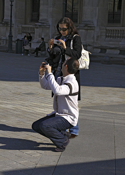 Taking Pictures in the Louvre Pyramid Courtyard.jpg
