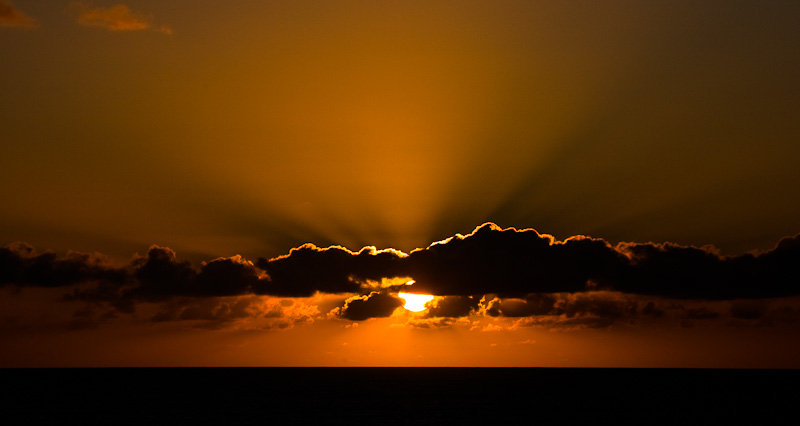 Sun and cloud in Pacific Ocean