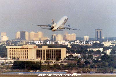 1983 - Pan Am DC-10 climbing out over Miami after runway 12 takeoff aviation stock photo