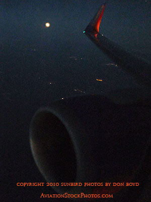 Harvest Moon rising as viewed from Southwest flight #2380 from FLL to BNA aviation stock photo #3819