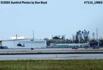 USAF H-60's Blackhawks landing at a deserted Signature ramp after Hurricane Wilma military aviation stock photo #7115