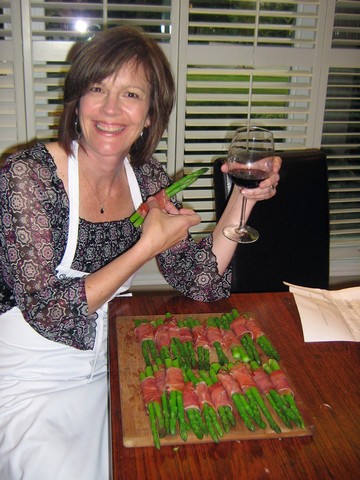 Cathy showing off the beautiful proscuitto wrapped asparagus