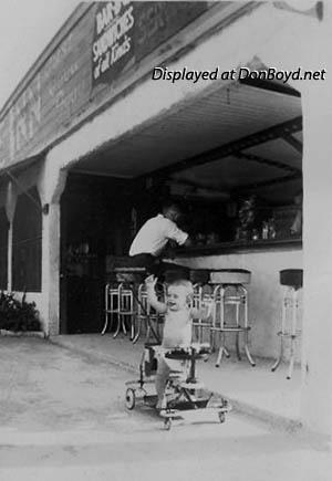 1942 - Kenny Zink in front of his dads bar, the Grove Inn, at 1480 NW 27 Avenue, Miami