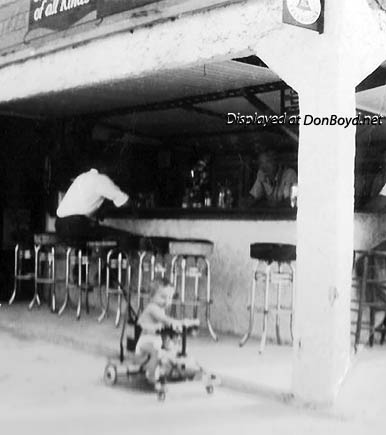 1942 - Kenny Zink (front) and his dad Kenneth Zink behind the bar, at the Grove Inn, at 1480 NW 27 Avenue, Miami