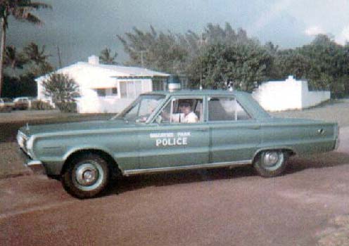 1968 - Officer Fred E. Daughtry Sr. in his Biscayne Park Police Department patrol car