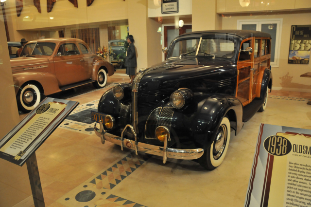 1939 Pontiac Woody station wagon, photographed through glass window