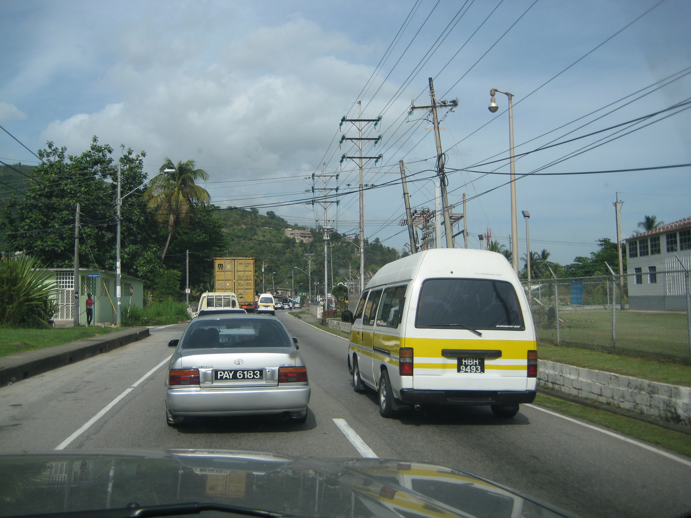 Maxi Taxi passing in oncoming traffic