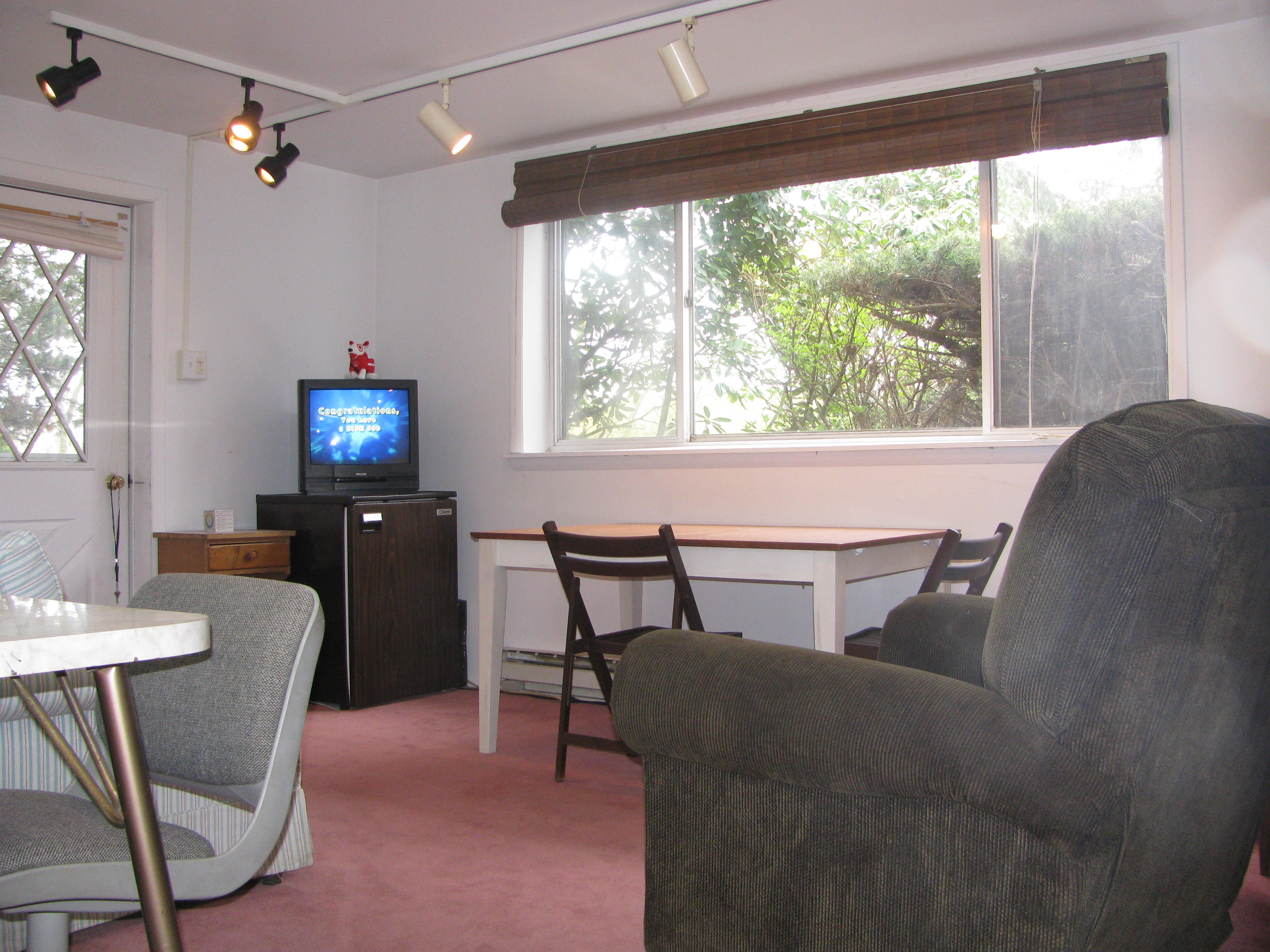 Living room with Recliner on wall.JPG