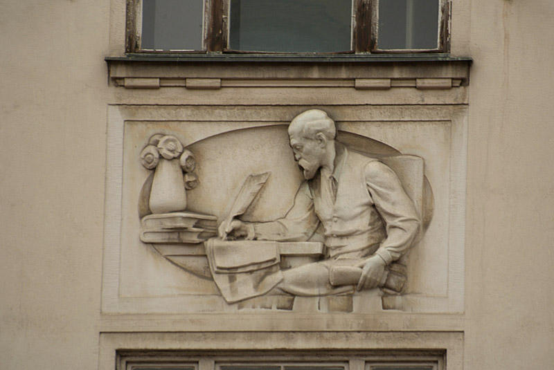 Building Detail - Man Writing