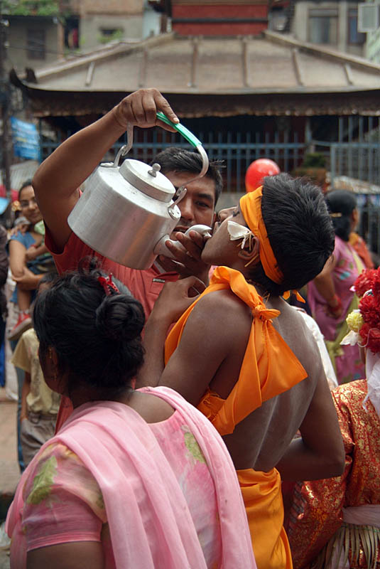 Boy Dressed as Saddhu Drinking Mile Gai Jatra