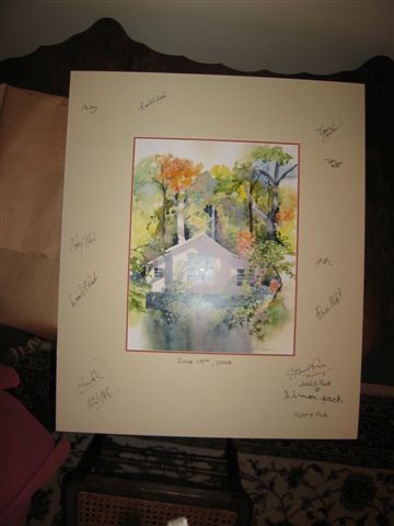 guest signed the matting on this print of one of the cottages (instead of a guest book)